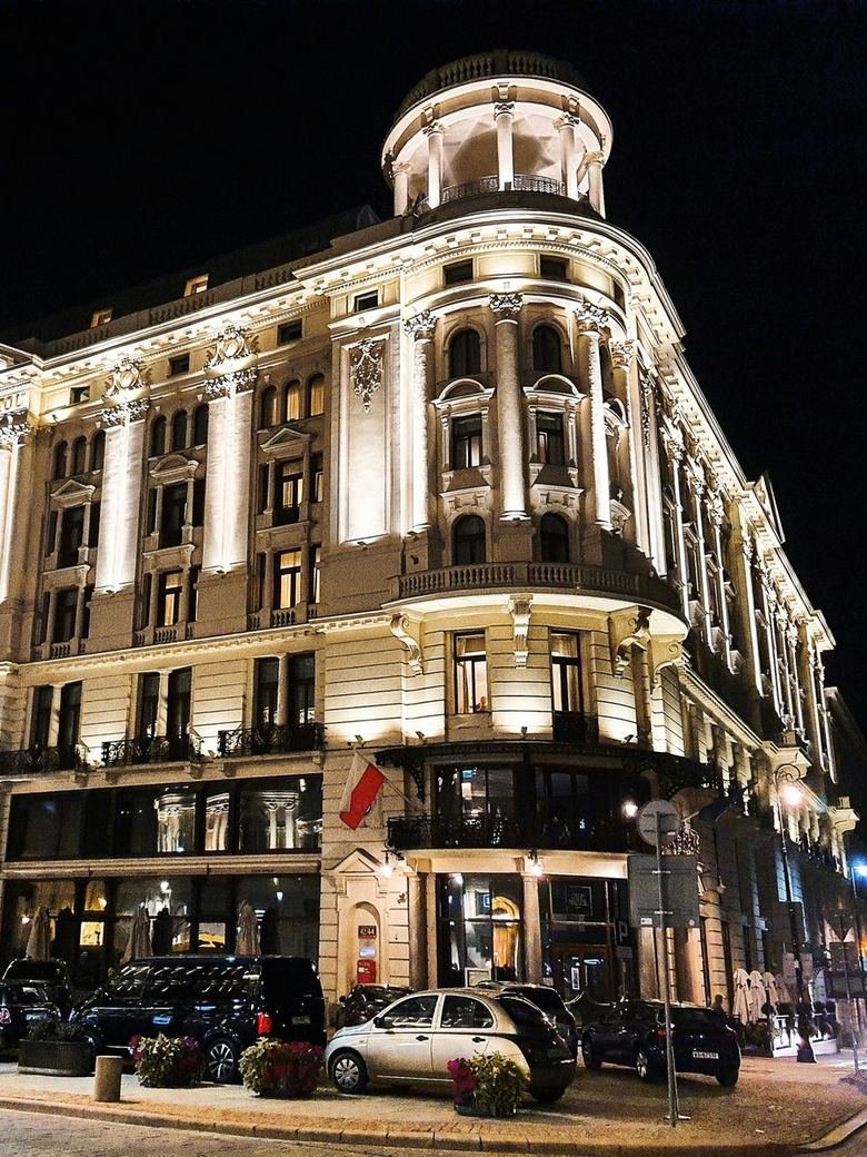 Facade of a heritage building lit at night